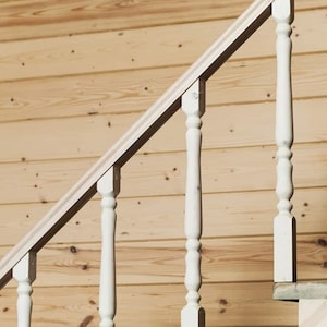Carved balustrade of wood, carved banister of wood, stair balusters