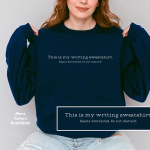 Writer sweatshirt. Graphic reads “this is my writing sweatshirt. Easily distracted. Do not disturb.” Gift for writers, authors, someone writing a book, fantasy writer, romance writer, aspiring author, teacher