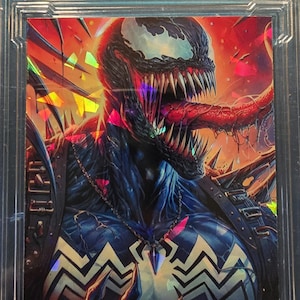 May include: A collectible trading card featuring a holographic image of Venom, a Marvel Comics superhero. The card has a red, orange, and yellow background with a holographic effect. The card is labeled "Venom" and "Custom Swag Refractor".