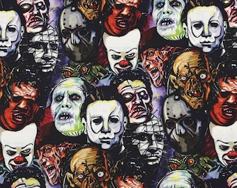 May include: A colorful fabric featuring a repeating pattern of various horror movie characters' faces. The faces are depicted in a cartoon style and include characters like Freddy Krueger, Jason Voorhees, and Michael Myers.