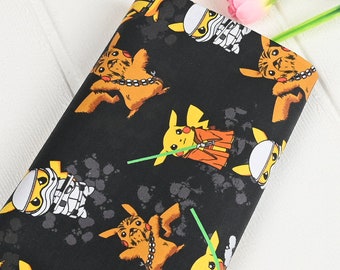 May include: Black fabric with a repeating pattern of yellow Pikachu characters dressed as Star Wars characters. The fabric also features a brown Chewbacca-like character and a white Stormtrooper-like character.