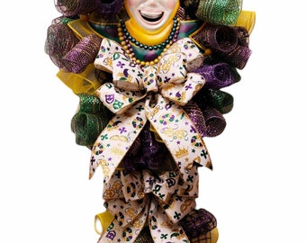 Corona de malla decorativa con cara de bufón de Mardi Gras