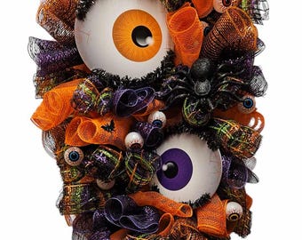Corona de Halloween con forma de globo ocular: Decoración espeluznante para fiestas (68 x 43 cm)