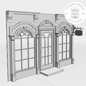 Puede incluir: Una maqueta gris de una fachada de tienda con ventanas arqueadas y una puerta central. La fachada presenta molduras decorativas, columnas y un peque&ntilde;o letrero. El texto "UPTOWN MINIS" y "CRAFTING HAPPINESS" es visible.