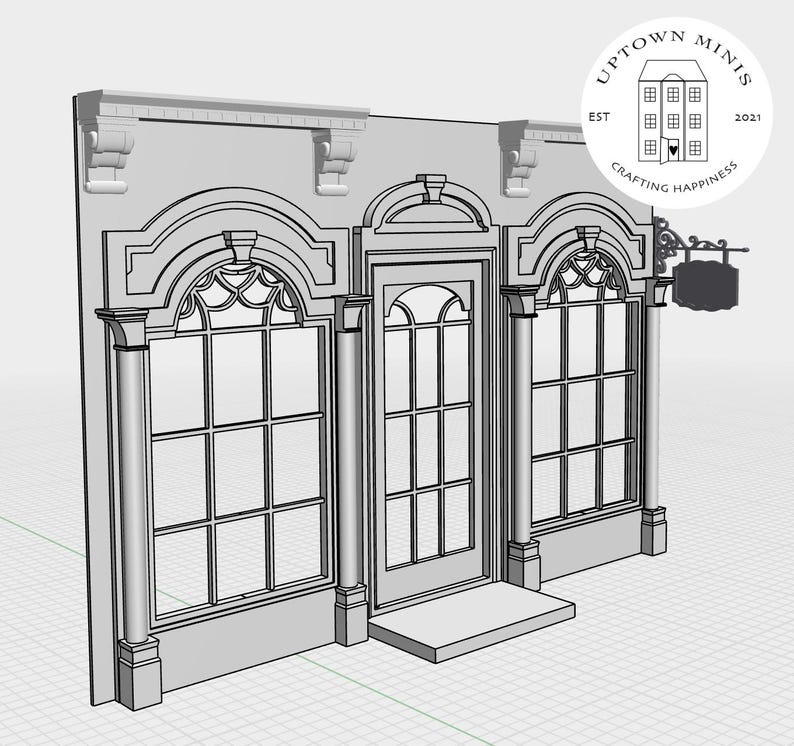 Puede incluir: Una maqueta gris de una fachada de tienda con ventanas arqueadas y una puerta central. La fachada presenta molduras decorativas, columnas y un peque&ntilde;o letrero. El texto "UPTOWN MINIS" y "CRAFTING HAPPINESS" es visible.