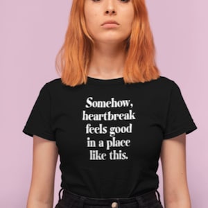 Somehow Heartbreak Feels Good In a Place Like This  t-shirt, Graphics tees, Comic Message T-Shirt