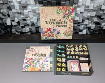 STL files for insert compatible with The Voynich Puzzle, includes files for token rings
