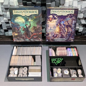 May include: White ceramic mug with a black handle, featuring the text "But First, Coffee" in black. The mug is shown against a blurred backdrop, implying a comfortable environment.