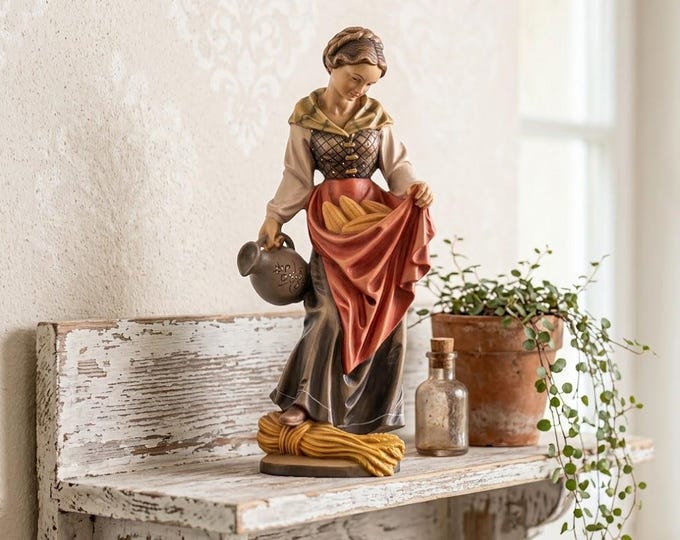 Sculpture of Saint Elizabeth with a jug carved in Valgardena wood, hand-decorated and handcrafted in Italy.