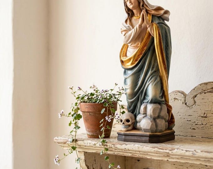 Sculpture of Saint Melania with skull carved in Valgardena wood, hand-decorated and handcrafted in Italy.