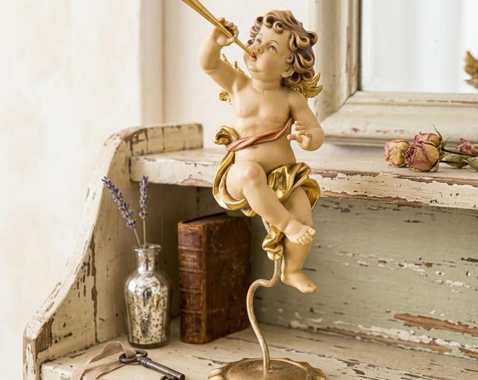 Angel sculpture, putto with trumpet on a pedestal, carved in Valgardena wood and hand-decorated, handcrafted in Italy