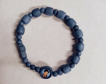 Blessed Carlo Acutis&#39;s blue stretch wood rosary bracelet, handcrafted in Italy.
