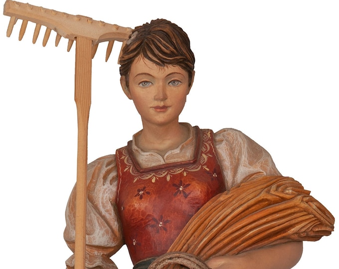 Statue of St. Notburga carved in wood from Valgardena and decorated by hand of Italian handicraft production