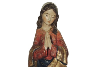 Statue sculpture of the Madonna in prayer, carved in wooden root of Valgardena decorated by hand of Italian artisan production
