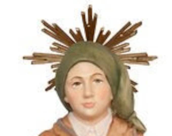 Scultua statue of St. Francis Marto, shepherd boy of Fatima, carved in wood of Valgardena and decorated by hand hand hand production