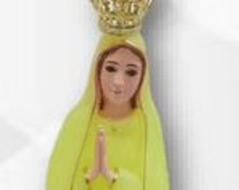 Statue of Our Lady of Fatima cm 38,5 (15,15 inches) in phosphorescent plastic with hand-decorated glass eyes of artisan production