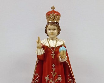 Statue of the Infant Jesus of Prague cm 42,5 x 19 (16,73 x 7,48 inches) in hand-decorated solid resin marble of handcrafted production