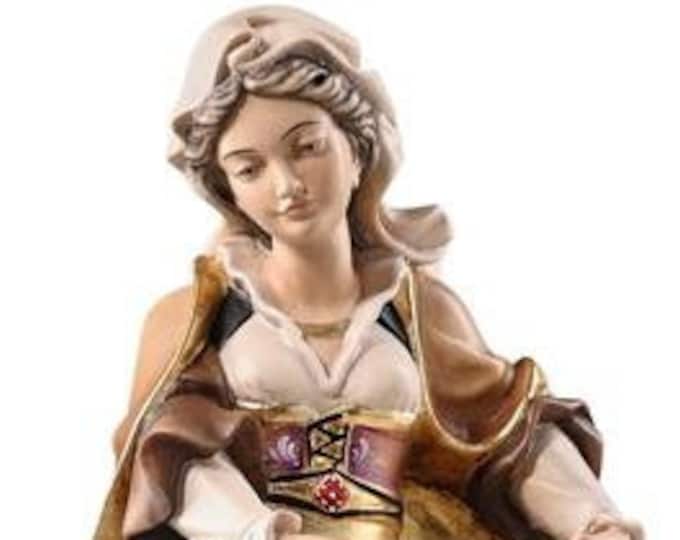 Statua di Santa Susanna con libro e spada, scolpita in legno della Valgardena e decorata a mano di produzione artigianale italiana
