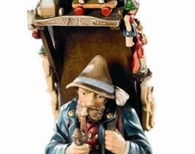 Sculpture of the street vendor carved in wood of Valgardena and decorated by hand of Italian artisan production