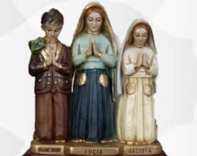Statue of the three little shepherds of Fatima, 21 cm (8,26 inches) made of resin finely decorated by hand, of artisan production