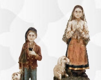 Pair of statues of Saint Jacinta and Saint Francis Marto, shepherd children of Fatima, 25 cm (9.84 inches) in resin decorated by hand hand