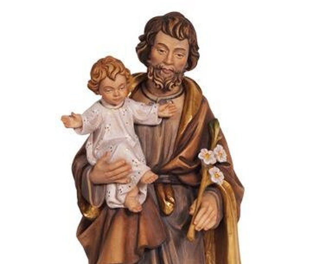 Statue of St. Joseph with baby Jesus and lily carved in wood from Valgardena and decorated by hand of Italian artisan production