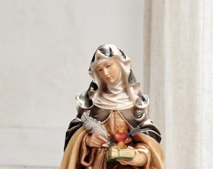 Statue of Saint Teresa of Avila carved from Valgardena wood and hand-decorated, handcrafted in Italy.