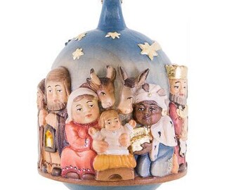 Christmas decoration ball with nativity scene in relief, carved in wood of Valgardena and decorated by hand of Italian artisan production