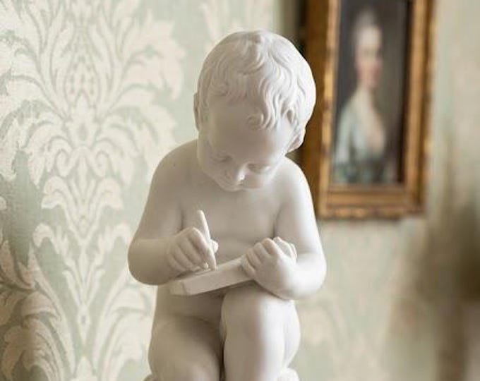 Classic sculpture "Putto che scrivere" by Canova, in alabaster powder, 19 cm (7.48 inches) of Italian artisan production.