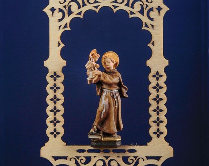 Statue of St. Anthony of Padua in the niche, carved in valgardena wood decorated by hand of Italian production