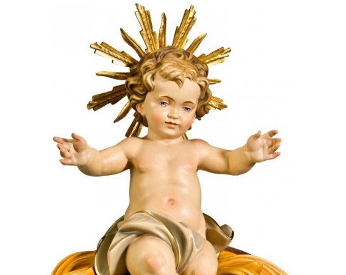 Sculpture statue of baby Jesus sitting on a cradle, carved in Valgardena wood and hand-decorated, of Italian artisan production