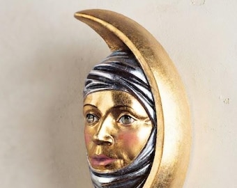 Hanging sun sculpture, carved from Valgardena wood and hand-decorated, handcrafted in Italy.