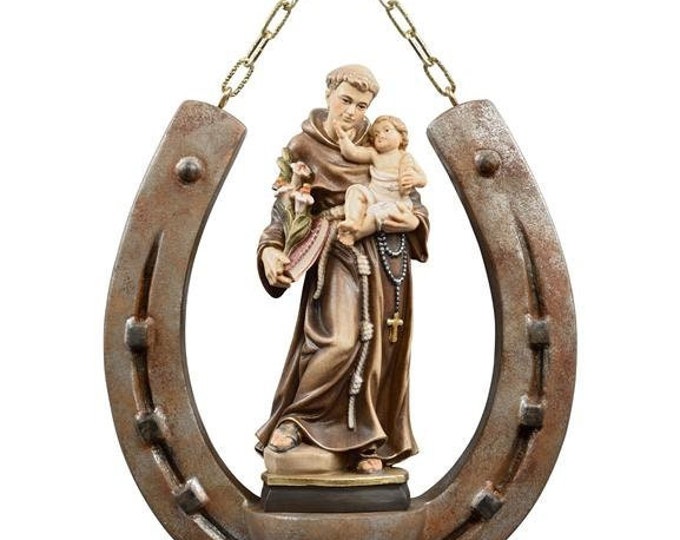 Sculpture of St. Anthony of Padua on horseshoe, carved in valgardena wood decorated by hand of Italian production