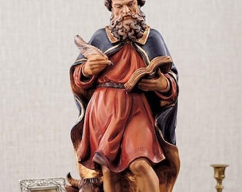 Statue of Saint Luke the Evangelist carved in Valgardena wood and hand-decorated, artisanal Italian production.