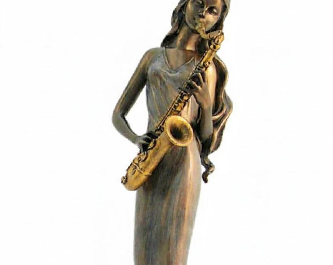 Classical sculpture of a female saxophone player, 34 cm (13.38 inches) in bronzed resin marble, handcrafted, made in Italy