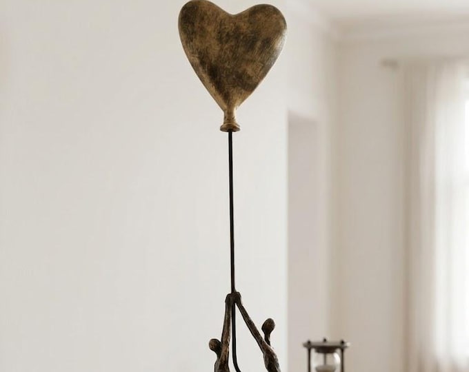 Classic sculpture Insieme in Volo cm 55 (21.65 inches) in bronzed resin marble, handcrafted in Italy