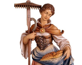 Statue of St. Notburga carved in wood from Valgardena and decorated by hand of Italian handicraft production