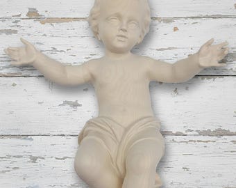 Baby Jesus sculpture statue, carved from natural Valgardena wood, handcrafted in Italy.