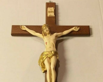 Crucifix cross to hang, in wood and resin marble decorated by hand of Italian artisan production