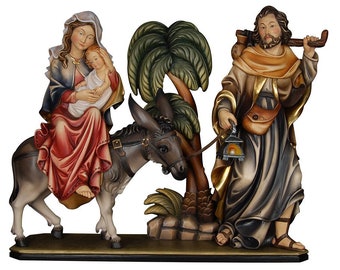 Sculpture statue Flight into Egypt carved in wood from Valgardena and decorated by hand of Italian handicraft production