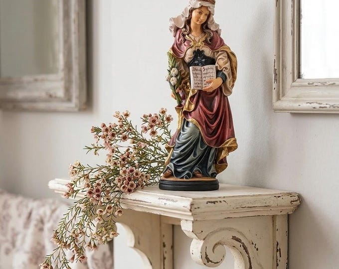 Statue of Saint Silvia carved from Valgardena wood and hand-decorated, handcrafted in Italy.