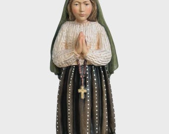 Statua di Santa Lucia di Fatima scolpita in legno della Valgardena e decorata a mano di produzione artigianale italiana varie misure