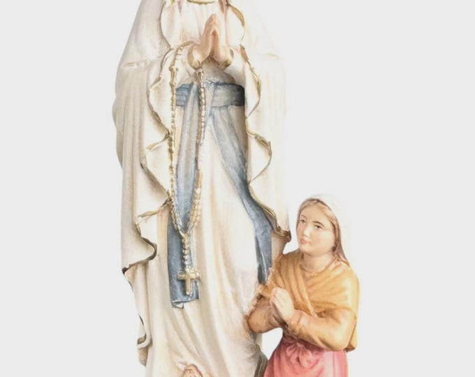 Statue of Our Lady of Lourdes with Bernadette carved in Valgardena wood, hand-decorated, made in Italy, various sizes.