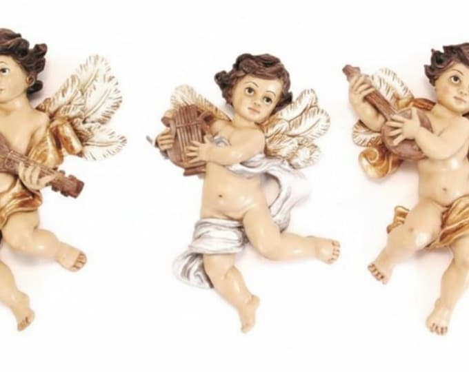 Three-piece wall angels, 31 x 22 cm (12.20 x 8.66 inches), hand-decorated resin, artisanal production, for indoor and outdoor use.