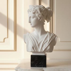 Classical sculpture "Bust of Artemis" made of alabaster powder, marble base, various sizes available Made in Italy