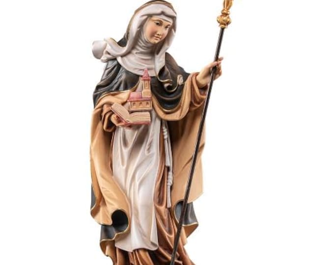 Sculpture of Saint Irma carved in Valgardena wood, hand-decorated and handcrafted in Italy.