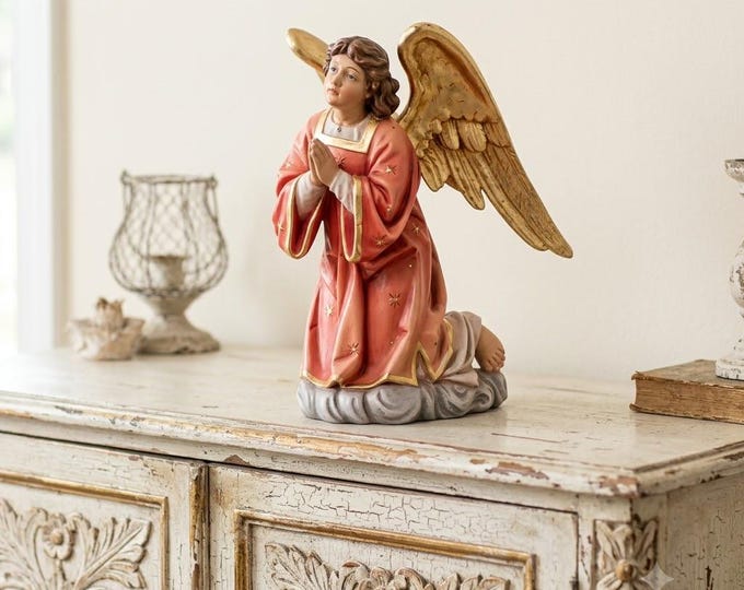 Kneeling angel sculpture, carved from Valgardena wood and decorated by hand, made in Italy, various sizes.