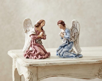 Pair of angels by Bernini, 22 cm (8.66 inches), made of alabaster powder, hand-decorated, made in Italy