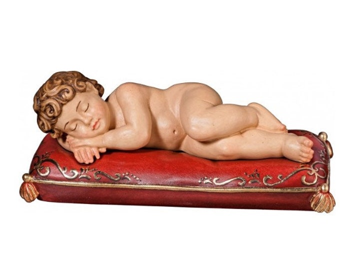 Sculpture statue of sleeping baby Jesus on a cushion, carved in Valgardena wood, hand decorated, Italian artisan production
