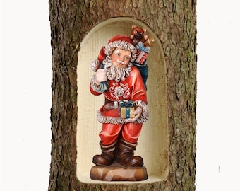 Santa Claus sculpture made from a tree trunk, carved from Valgardena wood and hand-decorated, handcrafted in Italy.